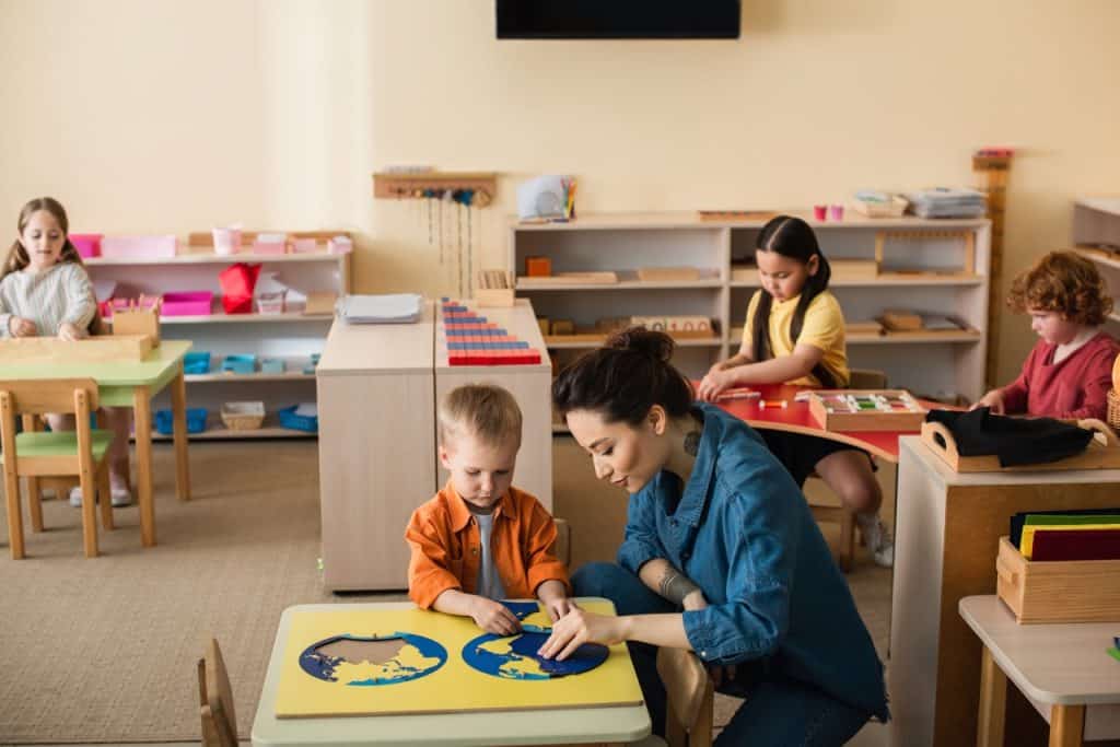 child and adult putting together a puzzle -A Large